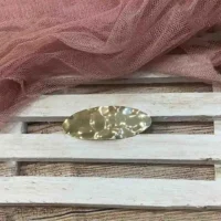 Broche Ovalado Dorado Brillo