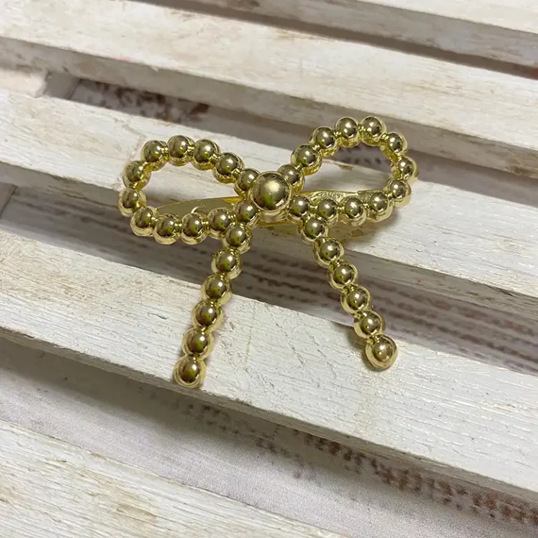 Broche Lazo Bolas Dorado